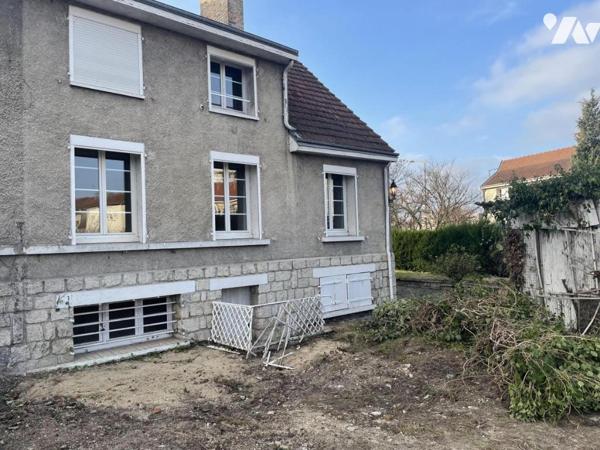 maison 5 pièces avec jardin et garage.