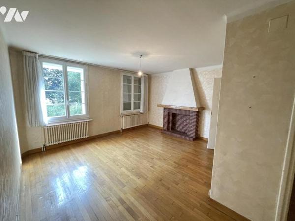 maison 5 pièces avec jardin et garage.