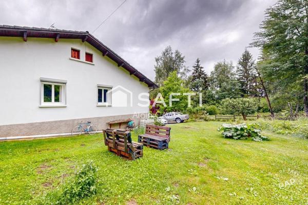 Maison de 103 m² avec terrasse,  garage en sous sol sur 1360m² de terrain cloturé