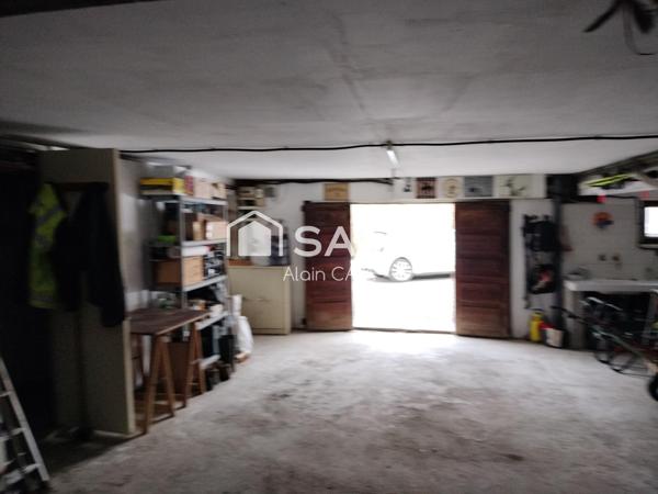 Maison de 103 m² avec terrasse,  garage en sous sol sur 1360m² de terrain cloturé