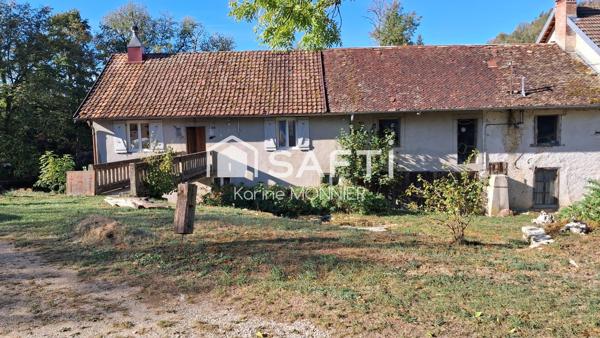 Maison en pierre située en bord de rivière