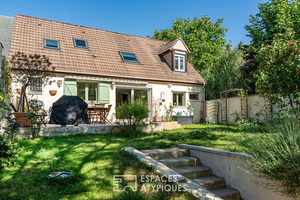 Maison en bord de Seine avec terrasses et jardin bucolique