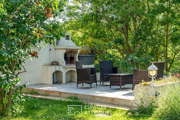 Maison en bord de Seine avec terrasses et jardin bucolique