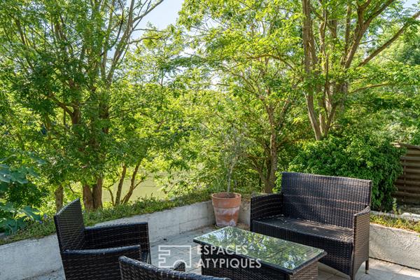 Maison en bord de Seine avec terrasses et jardin bucolique