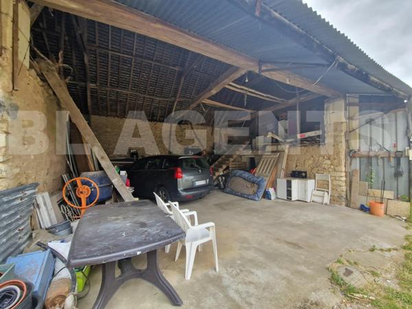 Grande maison de bourg avec jardin, grange et garage