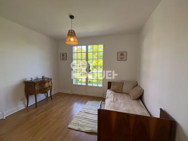 Maison plain-pied lumineuse avec jardin - Beynost
