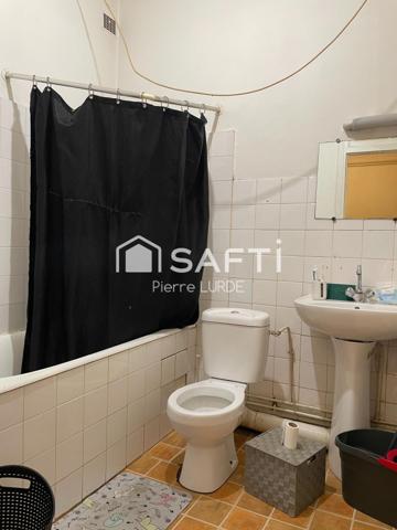 Vente immeuble de 181 m2 avec trois appartements