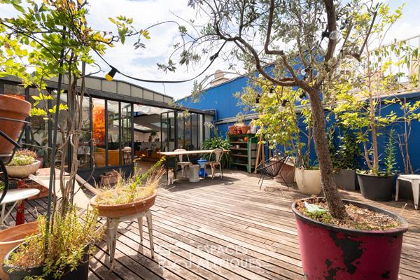 Loft avec terrasse dans un ancien atelier