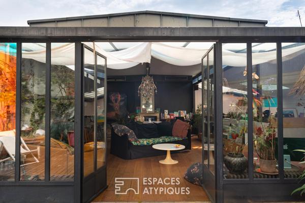 Loft avec terrasse dans un ancien atelier