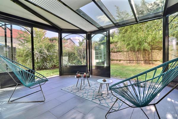 Appartement avec jardin 4 pièce(s) 132 m2 Carrez+ Véranda de 19m² + deux places de parking