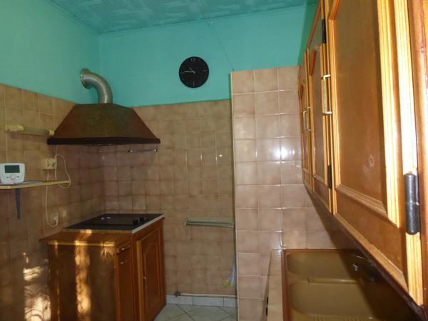 MAISON FAMILIALE A FORT POTENTIEL AVEC SES 4 CHAMBRES, SON TERRAIN ET SON GRAND GARAGE