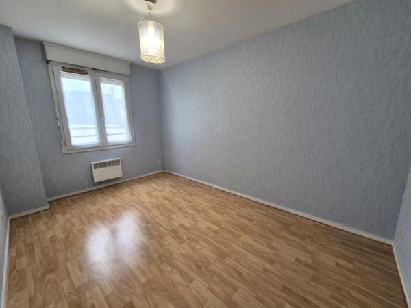 Appartement T3, cave et une place parking
