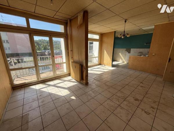 Appartement T4 (environ 75 m² habitables) situé au RDC