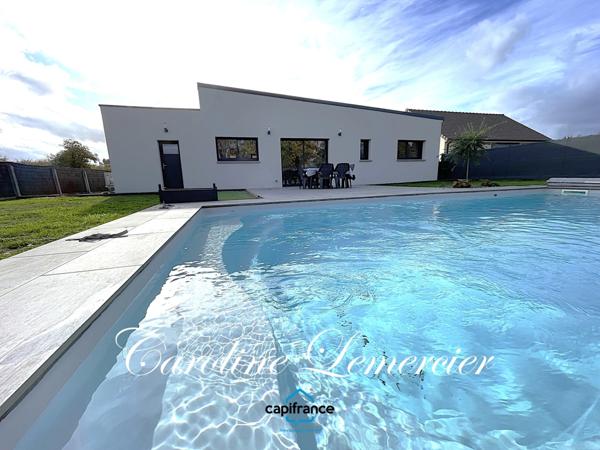 Maison à vendre 4 pièces (72)Maison contemporaine à toit plat 98 m² habitables, 3 chambres, terrain de 700 m², piscine chauffée