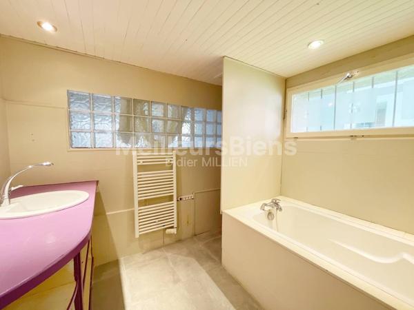 magnifique appartement avec cour de 85 m2 et garage