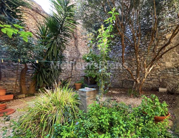 magnifique appartement avec cour de 85 m2 et garage