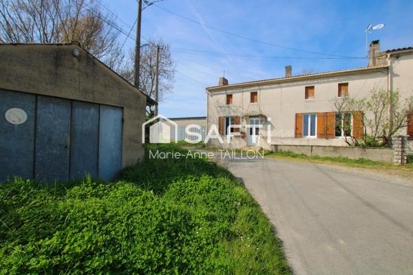 Maison à réinventer avec trois garages sur un terrain de 6 498 m2