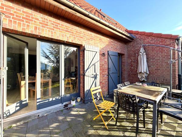 Maison de 109m², 4 chambres, jardin et garage