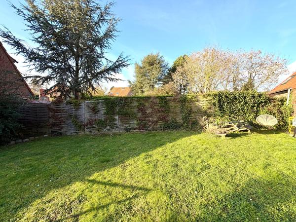 Maison de 109m², 4 chambres, jardin et garage