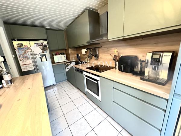 Maison 7 pièce(s) 4 chambre(s) 150 m²