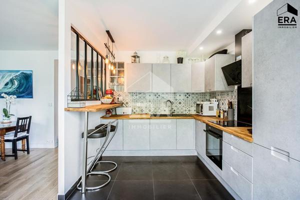 Appartement 3 pièces traversant avec deux balcons et box à 4 min de la gare