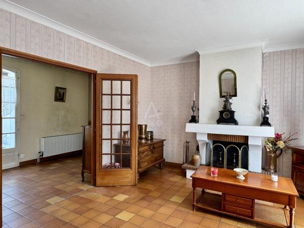 Magnac-sut-Touvre, maison 4 chb sur sous-sol semi enterré