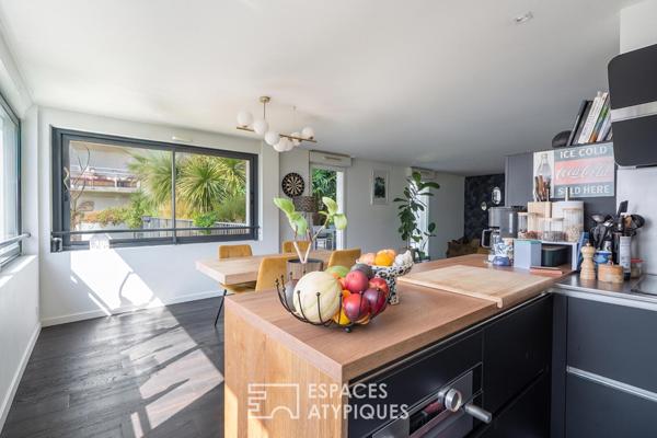 Appartement T3 de 84 m² avec terrasse de 60 m² paysagée, box et place parking