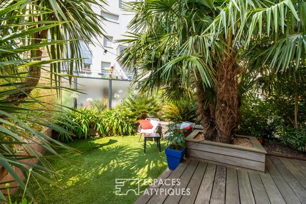 Appartement T3 de 84 m² avec terrasse de 60 m² paysagée, box et place parking