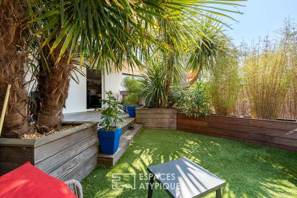 Appartement T3 de 84 m² avec terrasse de 60 m² paysagée, box et place parking