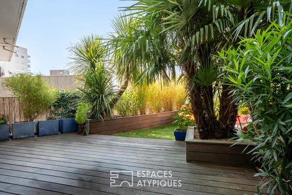 Appartement T3 de 84 m² avec terrasse de 60 m² paysagée, box et place parking