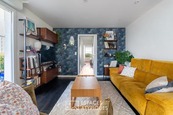 Appartement T3 de 84 m² avec terrasse de 60 m² paysagée, box et place parking