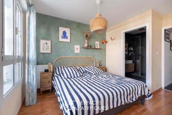 Appartement T3 de 84 m² avec terrasse de 60 m² paysagée, box et place parking
