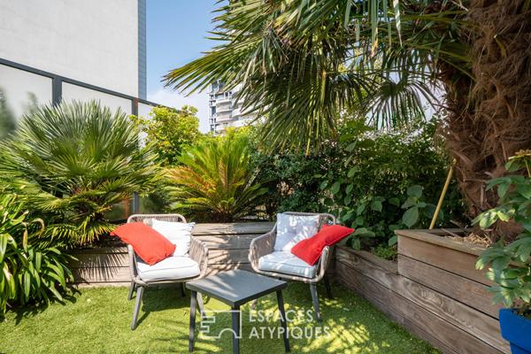 Appartement T3 de 84 m² avec terrasse de 60 m² paysagée, box et place parking