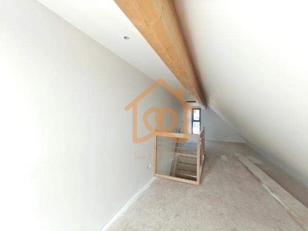 À Geispolsheim Village : Appartement avec garage, parking cave intégrale et un are de terrain