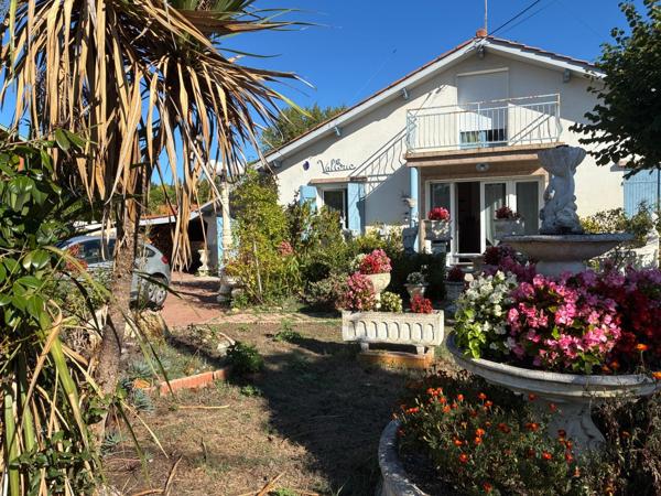 Lège bourg : maison 6 pièces de 123 m² avec véranda chauffée