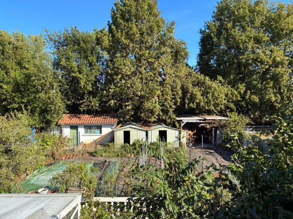 Lège bourg : maison 6 pièces de 123 m² avec véranda chauffée