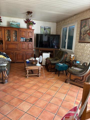 Lège bourg : maison 6 pièces de 123 m² avec véranda chauffée
