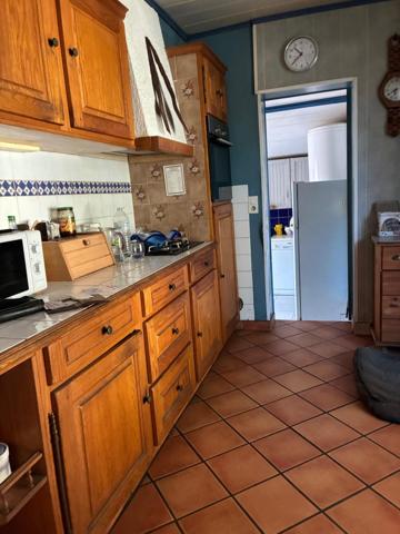 Lège bourg : maison 6 pièces de 123 m² avec véranda chauffée