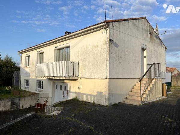 Maison 4 pièces élevée sur sous-sol complet