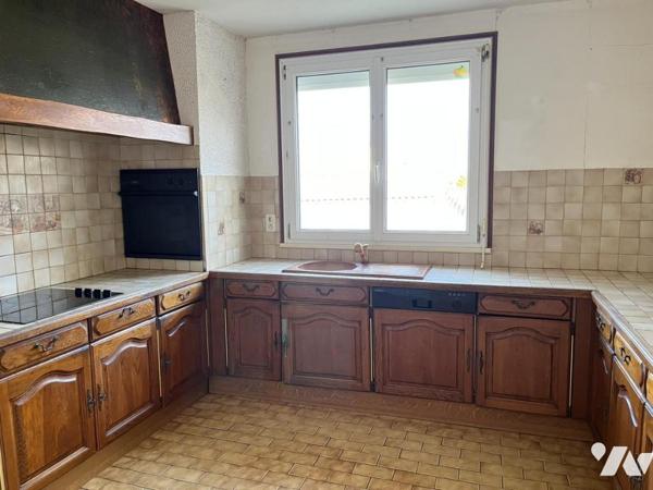 Maison 4 pièces élevée sur sous-sol complet