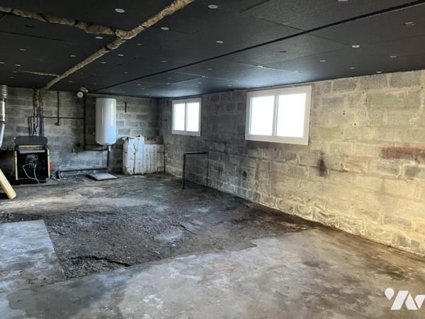 Maison 4 pièces élevée sur sous-sol complet
