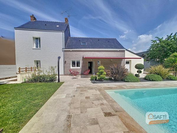 Maison avec piscine avec dôme électrique sur la commune d'Andouillé