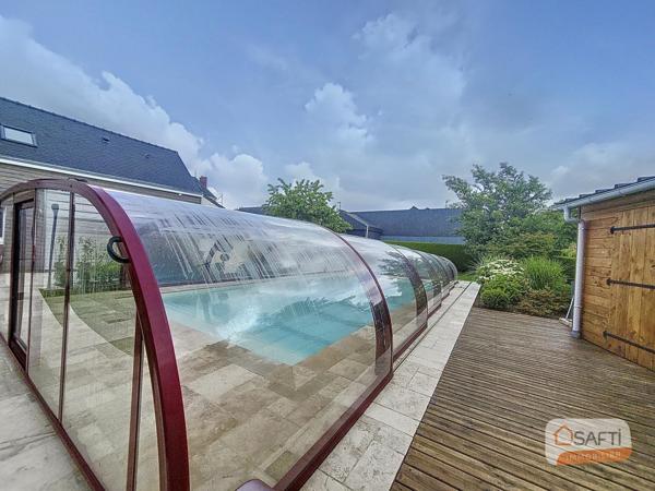 Maison avec piscine avec dôme électrique sur la commune d'Andouillé