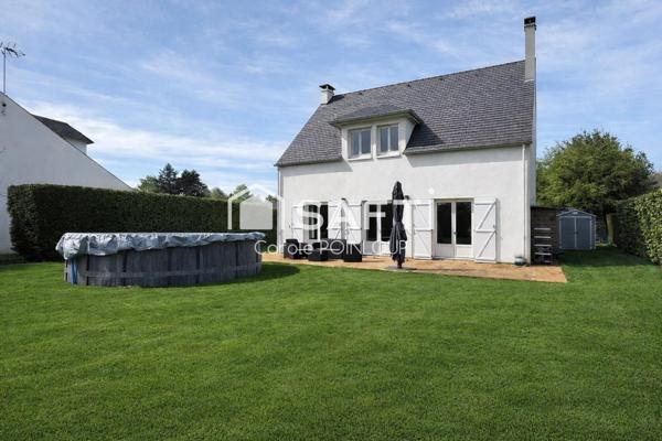 Maison individuelle dans un cadre verdoyant