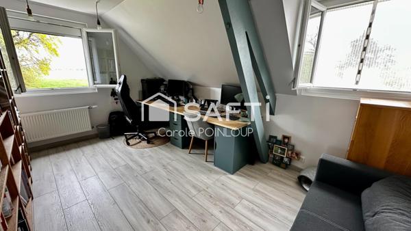 Maison individuelle dans un cadre verdoyant