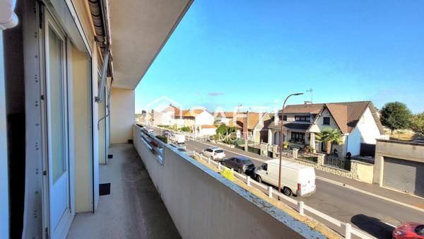Bel appartement au PREMIER ETAGE avec BALCON, CAVE et STATIONNEMENT SOUTERRAIN