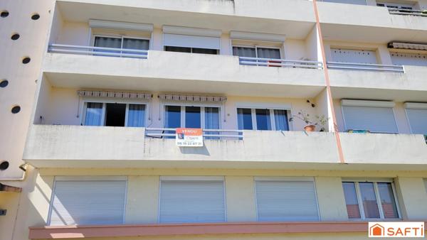 Bel appartement au PREMIER ETAGE avec BALCON, CAVE et STATIONNEMENT SOUTERRAIN