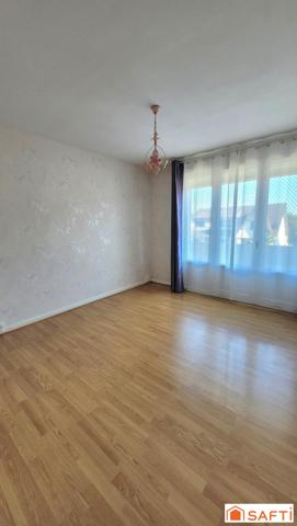 Bel appartement au PREMIER ETAGE avec BALCON, CAVE et STATIONNEMENT SOUTERRAIN