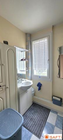 Bel appartement au PREMIER ETAGE avec BALCON, CAVE et STATIONNEMENT SOUTERRAIN