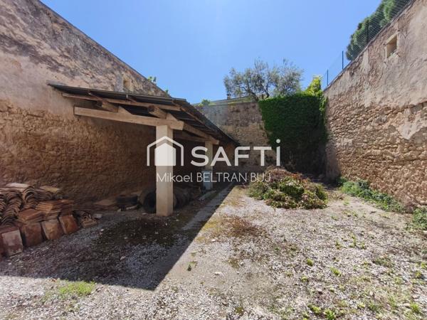 Maison de Maître avec appartement indépendant loué et garage